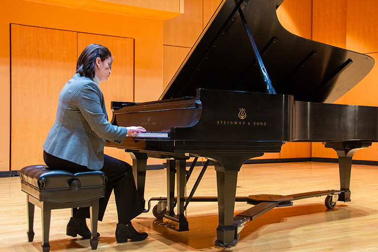 student playing piano