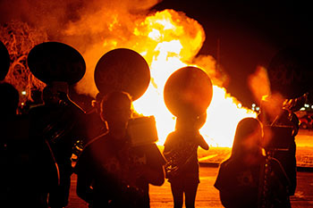 Greyhound Sound Members play in front of Homecoming Bonfire