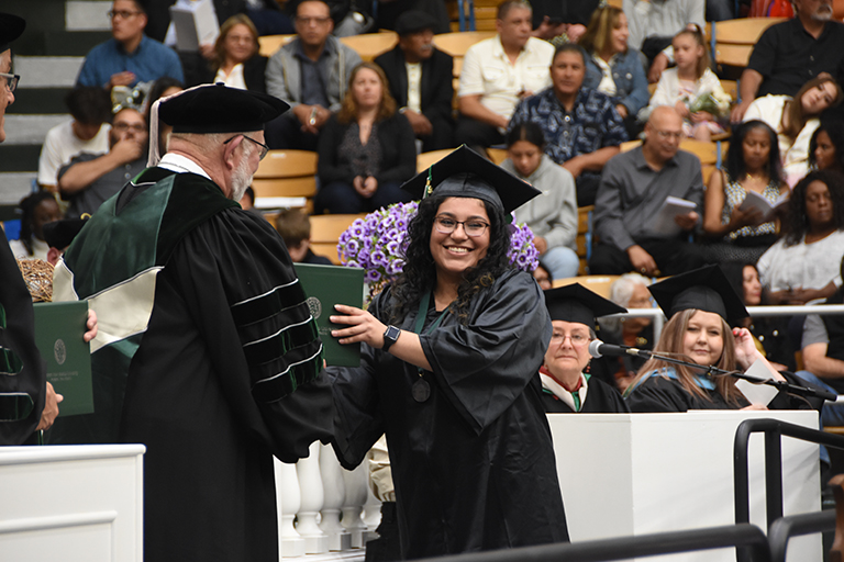 Photo of ENMU graduate from the Fall 2023 commencement.