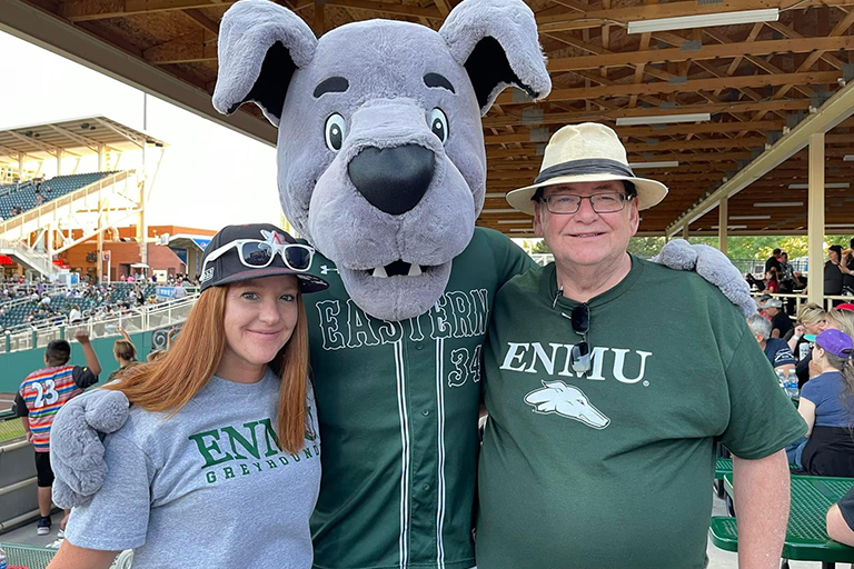 Alumni at a Game with Ralphie