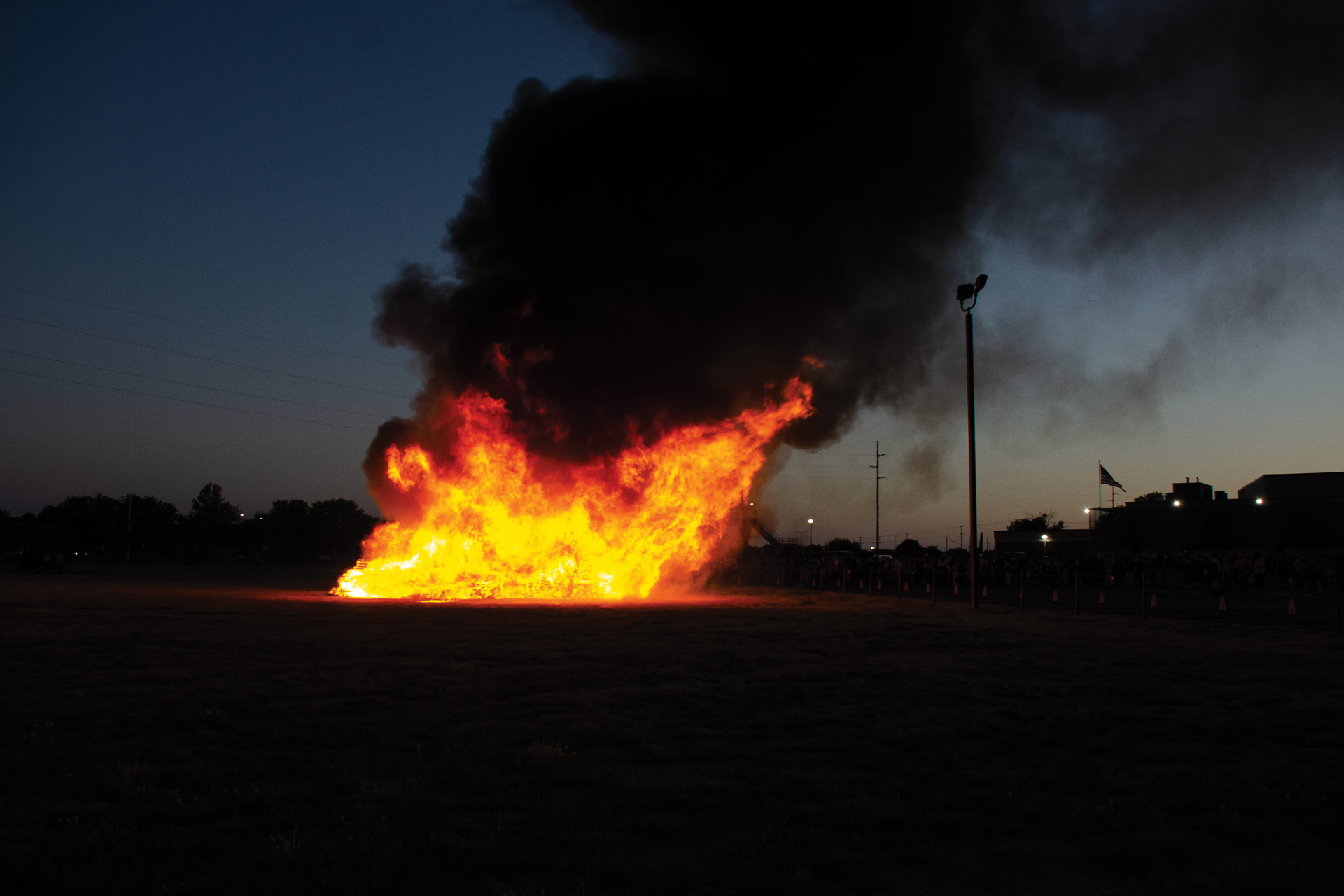 The Homecoming Bonfire Blazing at Sunset